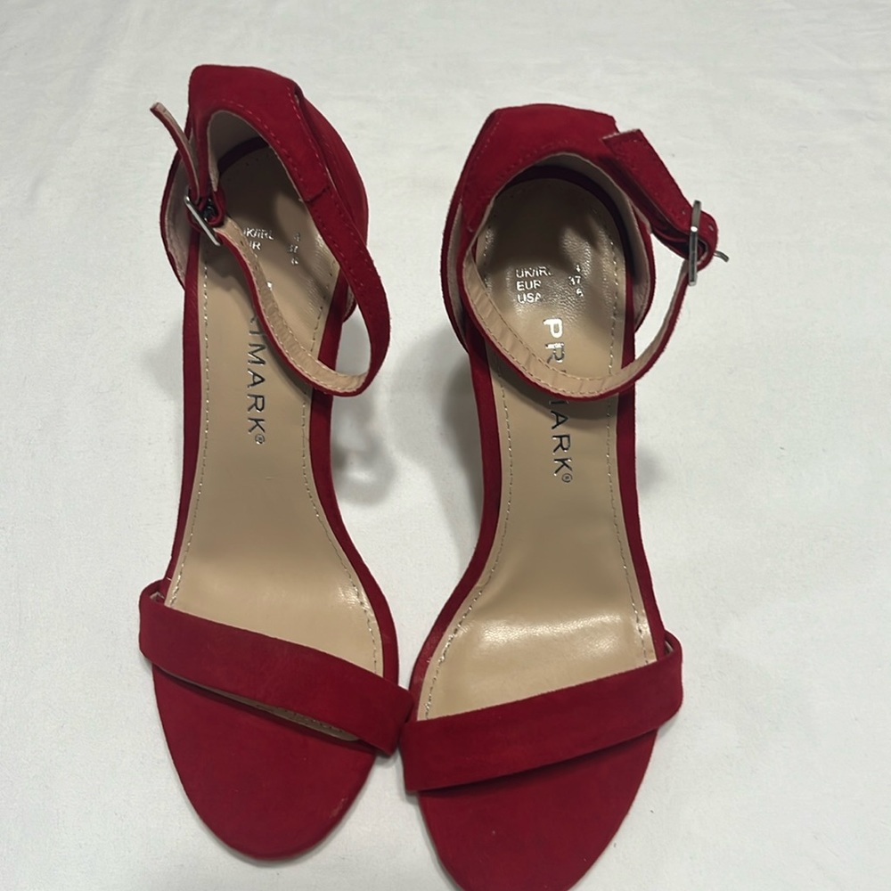 Woman’s Ankle Strap Red Heels